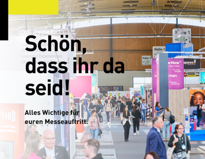 Blick in die Messehalle, daneben ein Willkommensschriftzug.